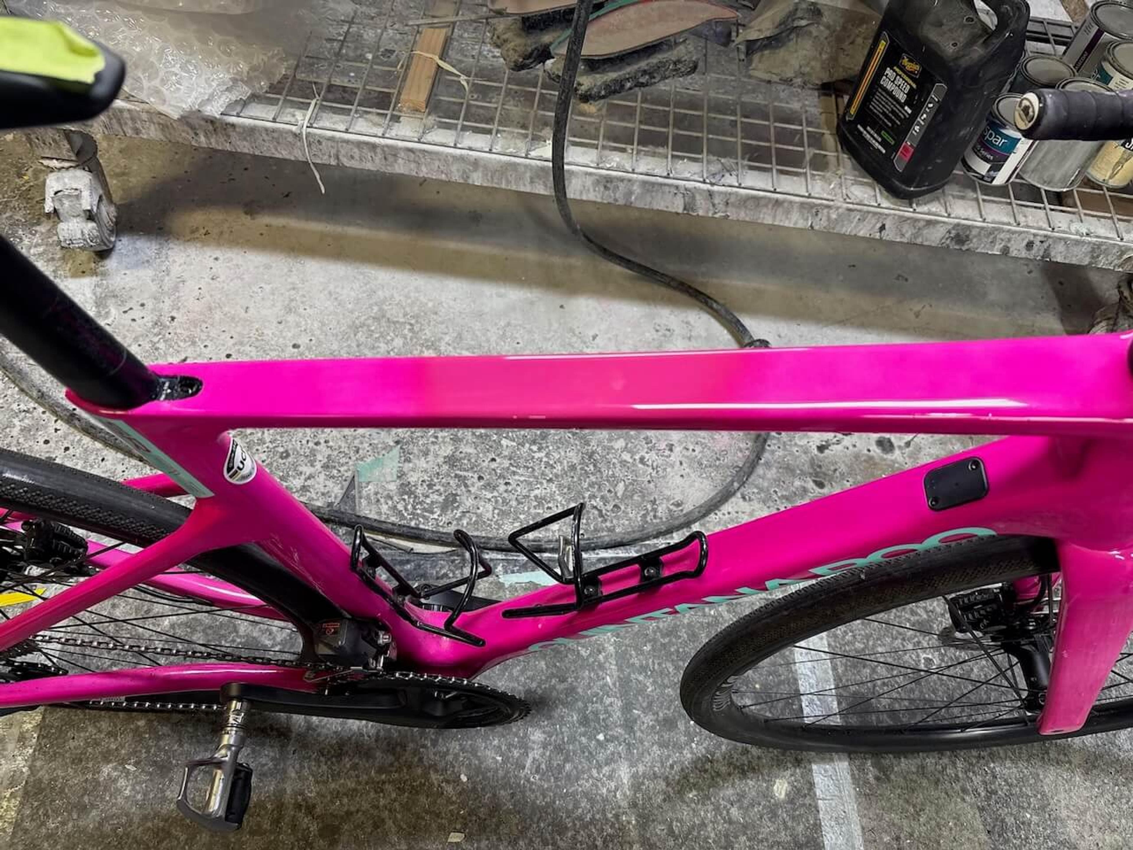 Finished pink Quintana Roo SRfive road bike after carbon fiber frame repair