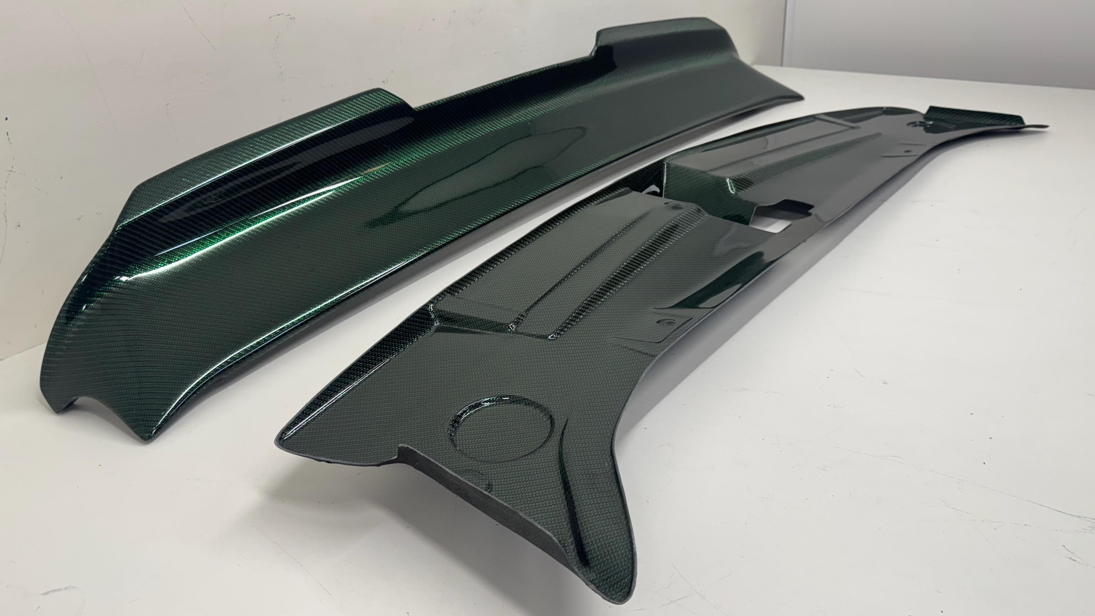 Green twill carbon fiber spoiler and radiator cover for 2016-2023 Dodge Challenger.